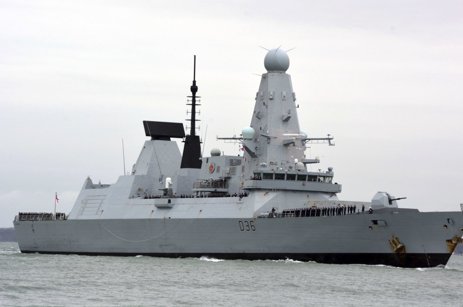 HMS Defender in Portsmouth, England, March 20, 2020. The Russian military said its warship had fired warning shots and a warplane dropped bombs to force the British destroyer from Russia's waters near Crimea in the Black Sea. (AP File Photo)