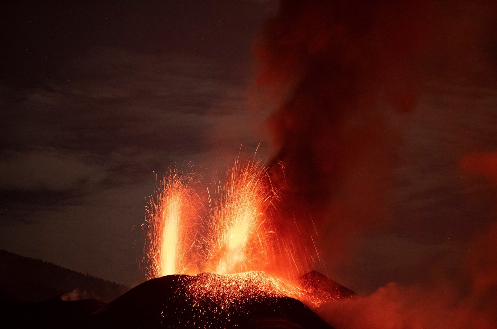 Cumbre Vieja volcano expels lava as seen from Tazacorte, La Palma, Canary Islands, Spain, Nov. 11, 2021. (EPA Photo)