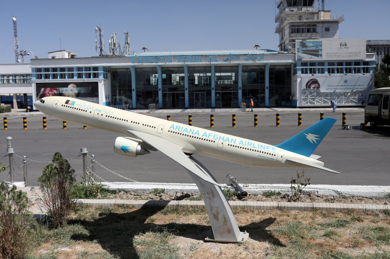 A model of an Ariana Afghan Airlines jet is seen in front of the international airport in Kabul, Afghanistan, Sept. 5, 2021. (WANA via Reuters)