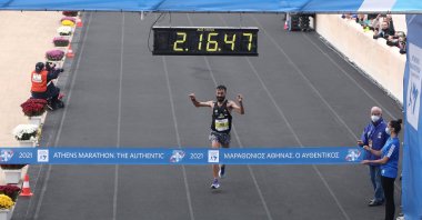 Greek long-distance runner Kostas Gkelaouzos wins the 38th Athens Authentic Marathon at the ancient Panathenaic Stadium in Athens, Greece, Nov. 14, 2021. (EPA Photo)