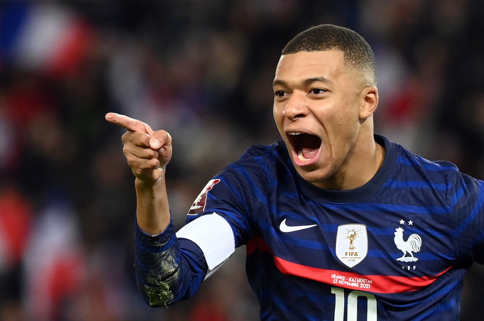France's forward Kylian Mbappe celebrates after scoring a goal during the FIFA World Cup 2022 qualification football match between France and Kazhkastan at the Parc des Princes stadium in Paris, on November 13, 2021. (AFP Photo)