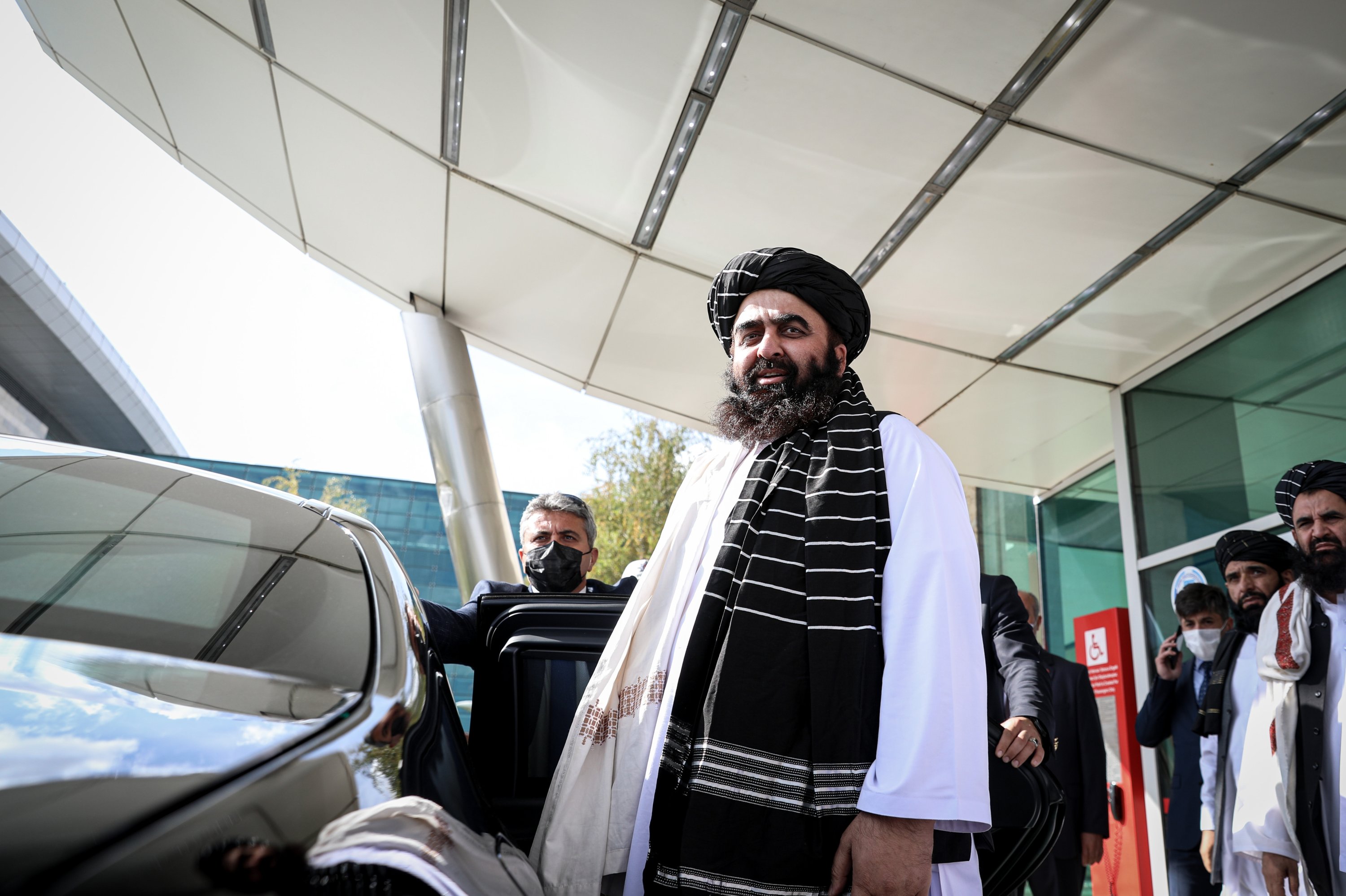 Accompanied by his delegation, the Taliban's Foreign Minister Amir Khan Muttaqi, arrives at Ankara Esenboğa Airport to meet Turkish officials, capital Ankara, Turkey, Oct. 14, 2021. (Photo by Getty Images)