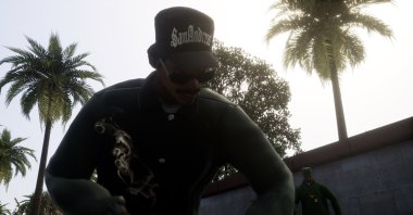 Ryder is seen during a cutscene with CJ in the background in this screenshot taken on Xbox Series S on Nov. 12, 2021 (Screenshot by Emre Başaran)