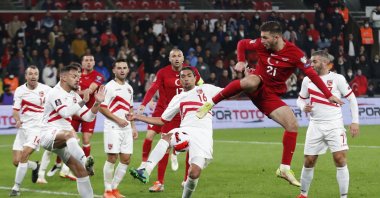 Turkey's Halil Dervişoğlu (R) in action with Gibraltar's Aymen Mouelhi, during the World Cup qualifier, in Istanbul, Turkey, Nov. 13, 2021. (REUTERS PHOTO) 