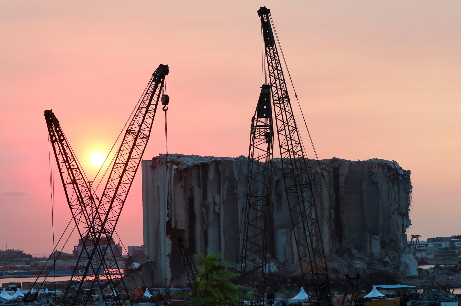 A view shows the grain silo that was damaged during last year&#039;s Beirut port blast, during sunset in Beirut, Lebanon, July 29, 2021. (Reuters Photo)