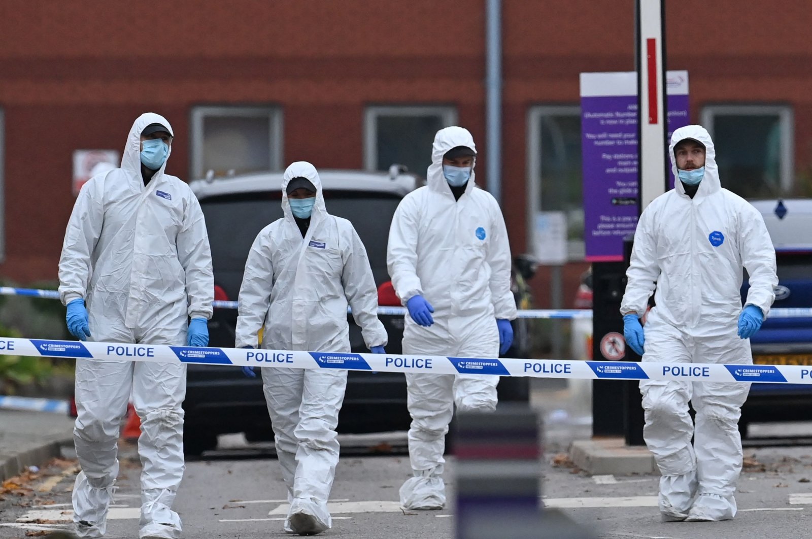 Police forensics officers depart after working outside Liverpool Women&#039;s Hospital in Liverpool, Britain, Nov. 15, 2021. (AFP Photo)