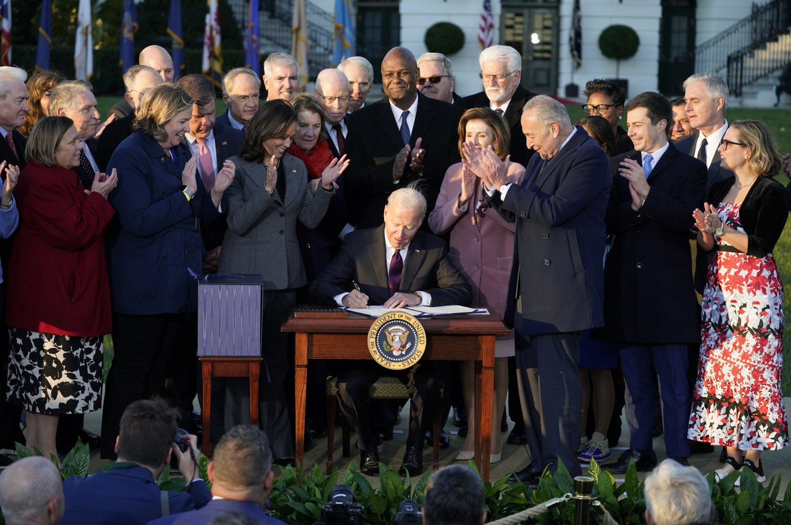 U.S. President Joe Biden signs the "Infrastructure Investment and Jobs Act" during an event on the South Lawn of the White House, in Washington, U.S., Nov. 15, 2021. (AP Photo)