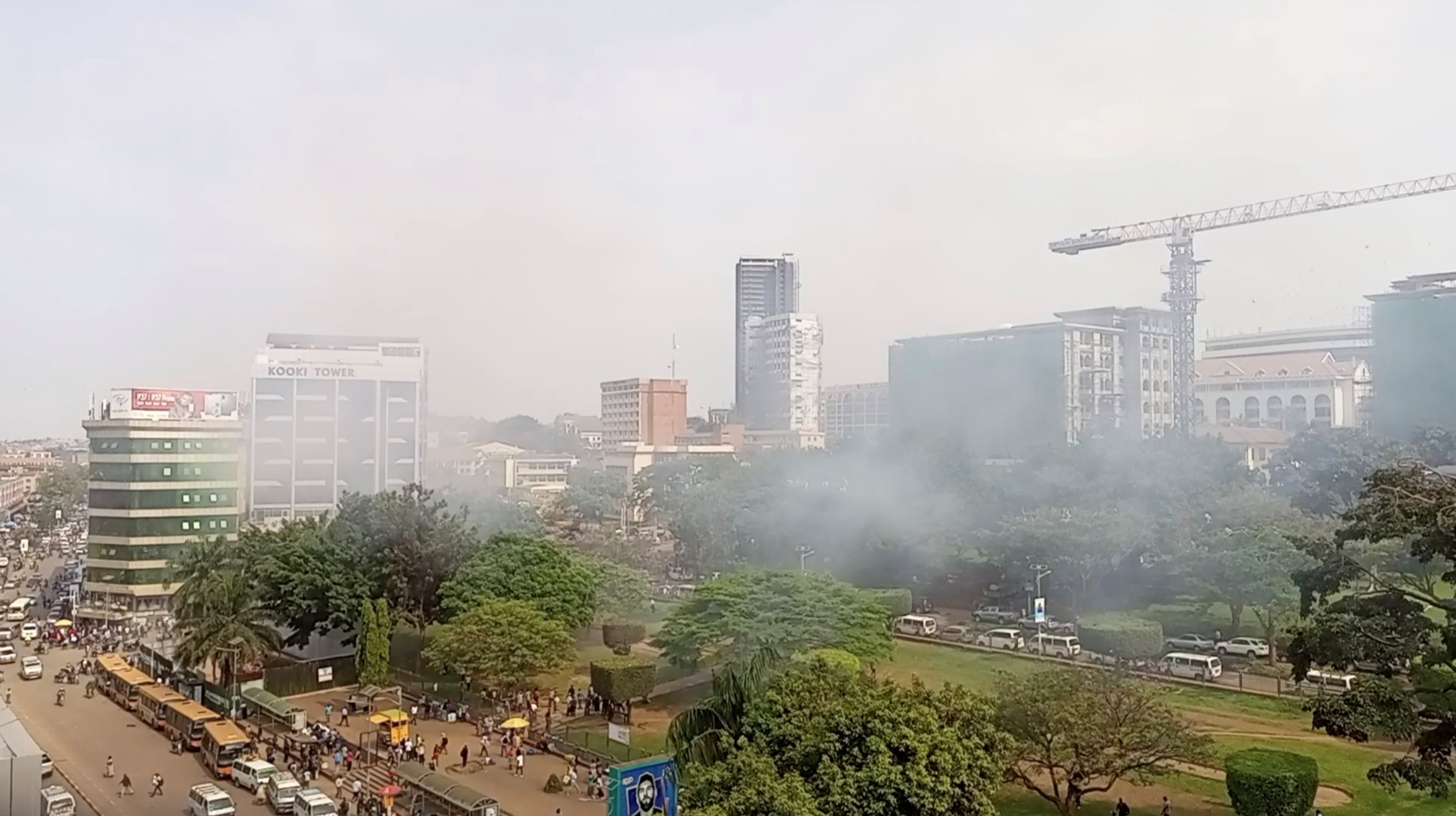  In this still image obtained from a social media video, smoke rises near the blast area, in Kampala, Uganda, Nov. 16, 2021. (Ssenyonyo Umaru via Reuters)