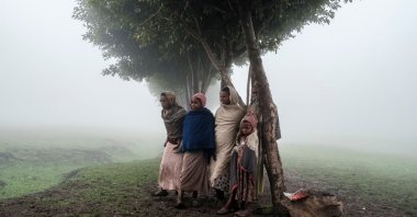 In this file photo, children stand under a tree on the site of a future camp for Eritrean refugees, in a rural area near the village of Dabat, 70 kilometers northeast of the city of Gondar, Ethiopia, July 13, 2021. (AFP Photo)