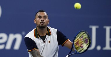 Nick Kyrgios returns a shot against Roberto Bautista Agut during a U.S. Open tennis match in New York, U.S., Aug. 30, 2021. (AP Photo)
