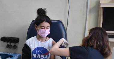 A woman gets vaccinated against COVID-19 at a hospital in Izmir, western Turkey, Nov. 16, 2021. (DHA Photo)