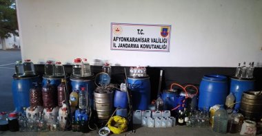 Gendarmerie display seized bootleg drinks in Sultandağı district in Afyon, western Turkey, Nov. 16, 2021. (İHA PHOTO)