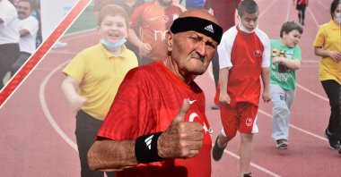 Turkish marathon runner Ahmet Kahveci, 74, continues to take part in running events all over Turkey despite his advanced age, Mersin, Turkey, Nov. 16, 2021. (IHA Photo)