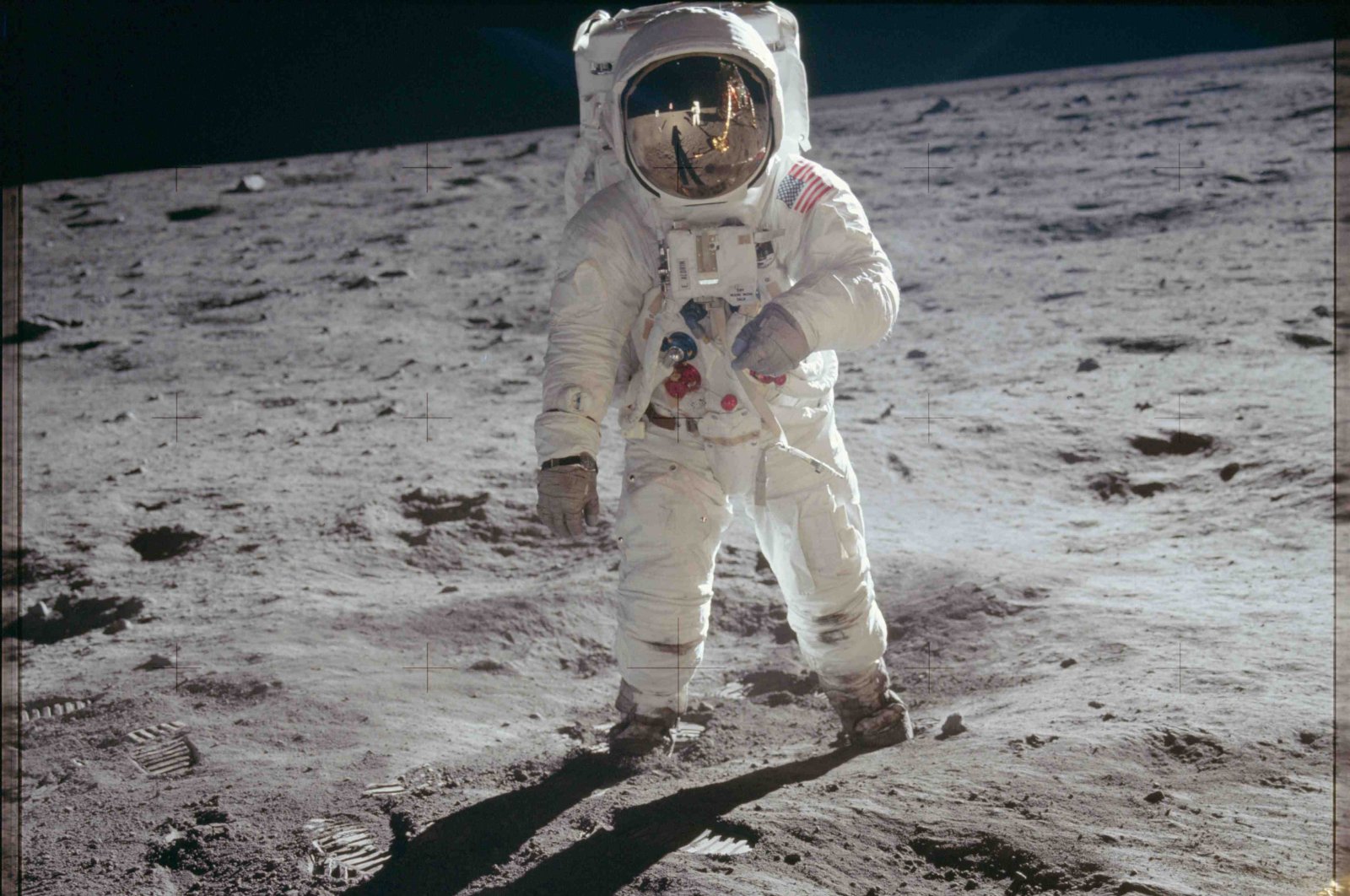 Astronaut Edwin E. Aldrin Jr., lunar module pilot, walks on the surface of the moon near the leg of the Lunar Module (LM) &quot;Eagle&quot; during the Apollo 11 extravehicular activity (EVA) in this July 20, 1969. (NASA Handout Photo via Reuters)