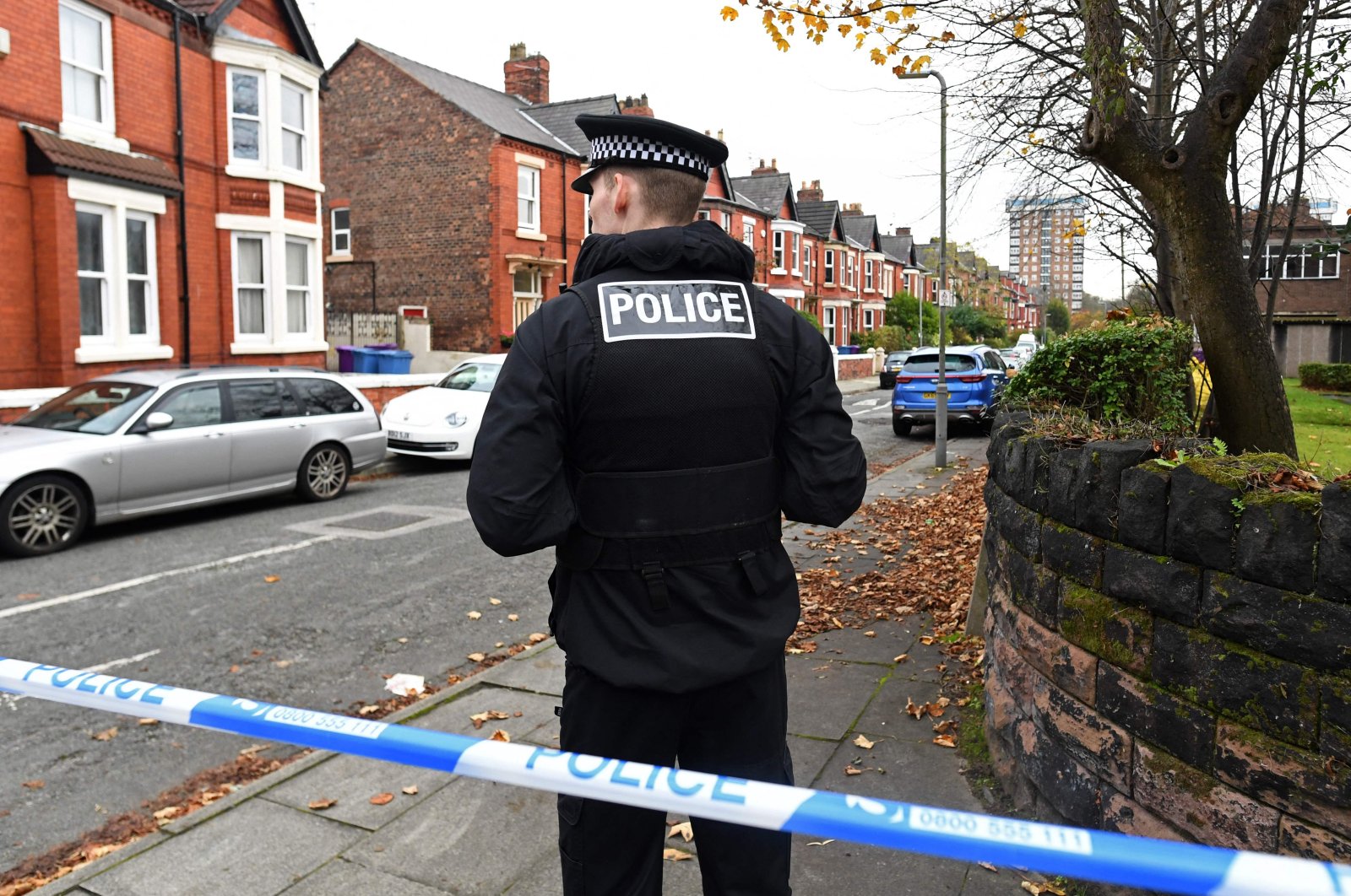 A police officer works inside a cordoned-off area on Rutland Avenue, the place where police have confirmed the passenger of the taxi that later exploded outside the Women&#039;s Hospital in Liverpool was picked up, Liverpool, U.K., Nov. 15, 2021. (AFP Photo)