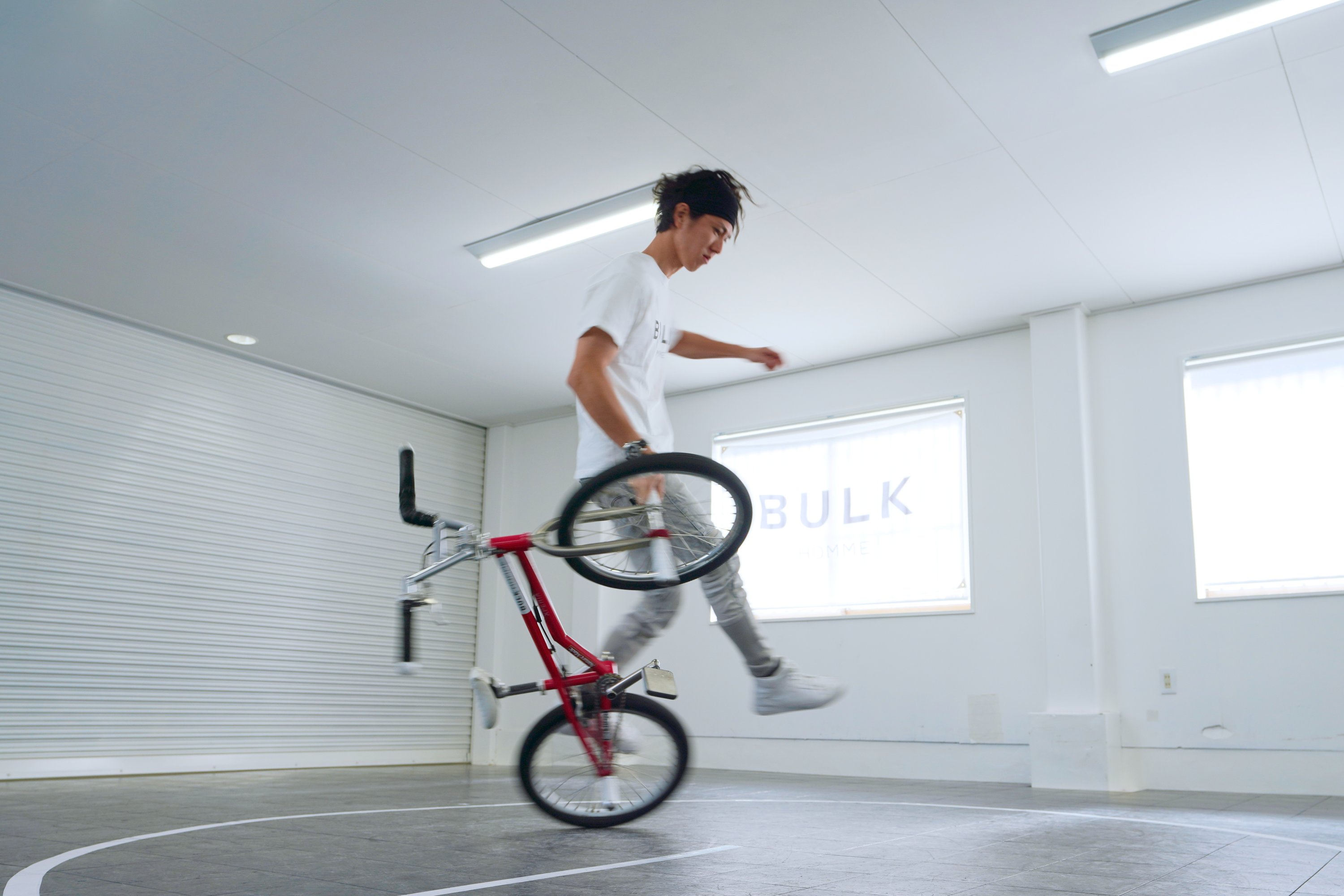 Takahiro Ikeda, 31, breaks the new Guinness World Record for "Most BMX Stick B in 30 seconds" in Chiba, Japan, Oct. 20, 2021. (Courtesy of Guinness World Records 2021/Masakazu Senda via Reuters)