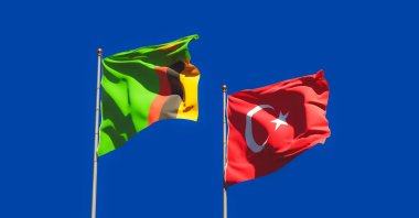 The flags of Zambia and Turkey. (Shutterstock)