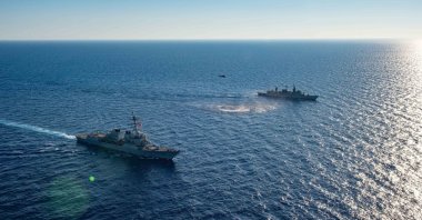 This handout photo dated Aug. 24, 2020, shows the Arleigh Burke-class guided-missile destroyer USS Winston S. Churchill (DDG 81) executing maneuvering drills with the Greek navy warship Kortenaer FF Class Aegean (F 460) off the coast of Crete, in the Mediterranean Sea. (Reuters Photo)