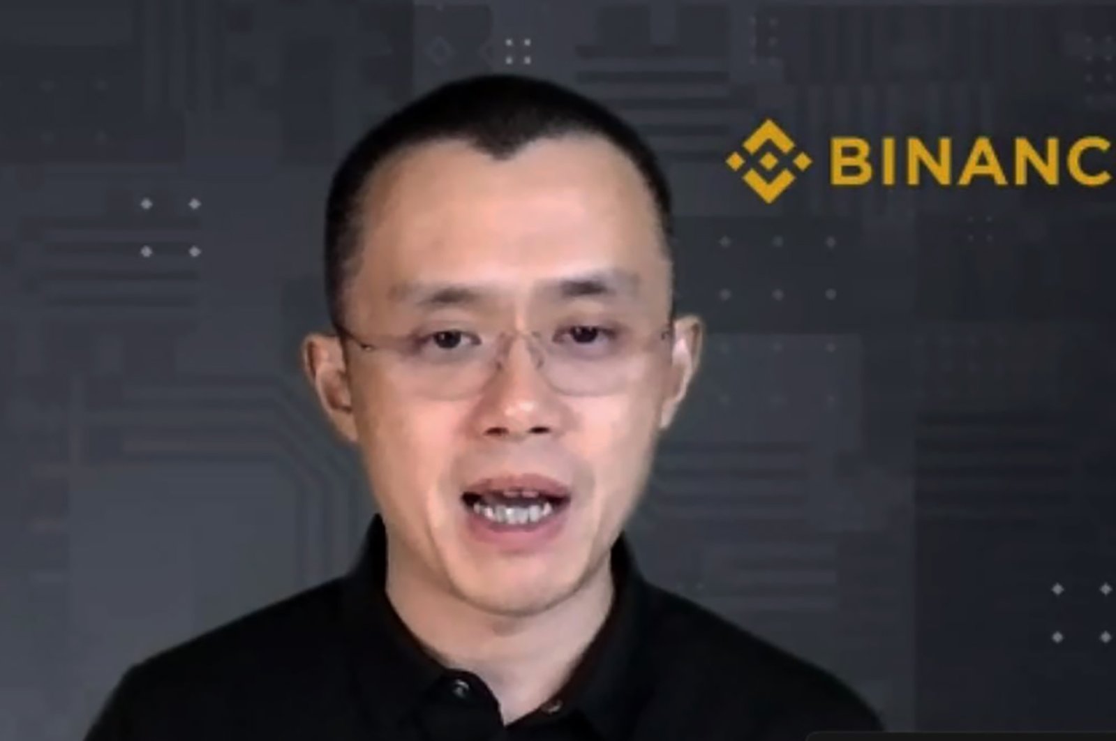 Binance CEO Changpeng Zhao answers a question during a Zoom meeting interview with The Associated Press, Nov. 16, 2021. (AP Photo)