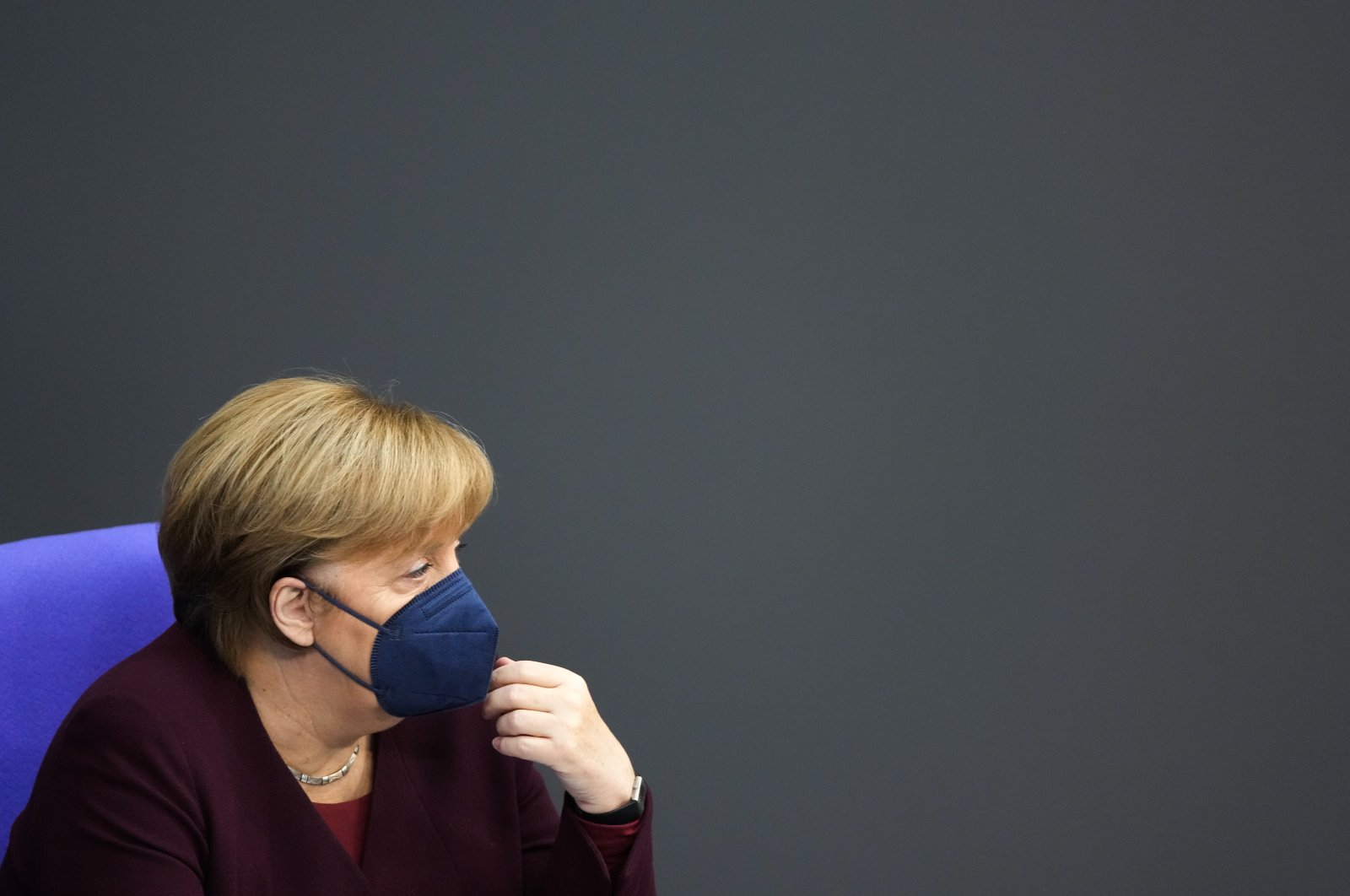 German Chancellor Angela Merkel attends a debate about the measures to battle COVID-19 at the Bundestag in Berlin, Germany, Nov. 11, 2021. (AP Photo)