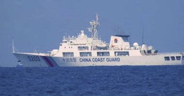 A Chinese coast guard vessel is seen patrolling in the South China Sea, taken sometime on April 13-14, 2021. (AP Photo)