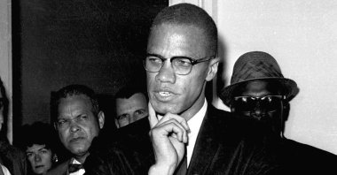 Malcolm X speaks to reporters in Washington, D.C., U.S., May 16, 1963. (AP Photo)