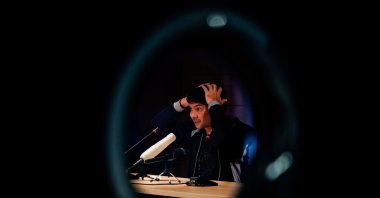 Cuban protest leader Yunior Garcia gestures as he attends a news conference after he and his wife landed at Madrid's Barajas airport on Wednesday afternoon, in Madrid, Spain, Nov. 18. (REUTERS/Juan Medina)