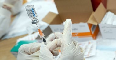 A registered nurse fills a syringe with the Johnson &amp; Johnson COVID-19 vaccine at a pop-up vaccination site in the Staten Island borough of New York, U.S., April 8, 2021. (AP File Photo)