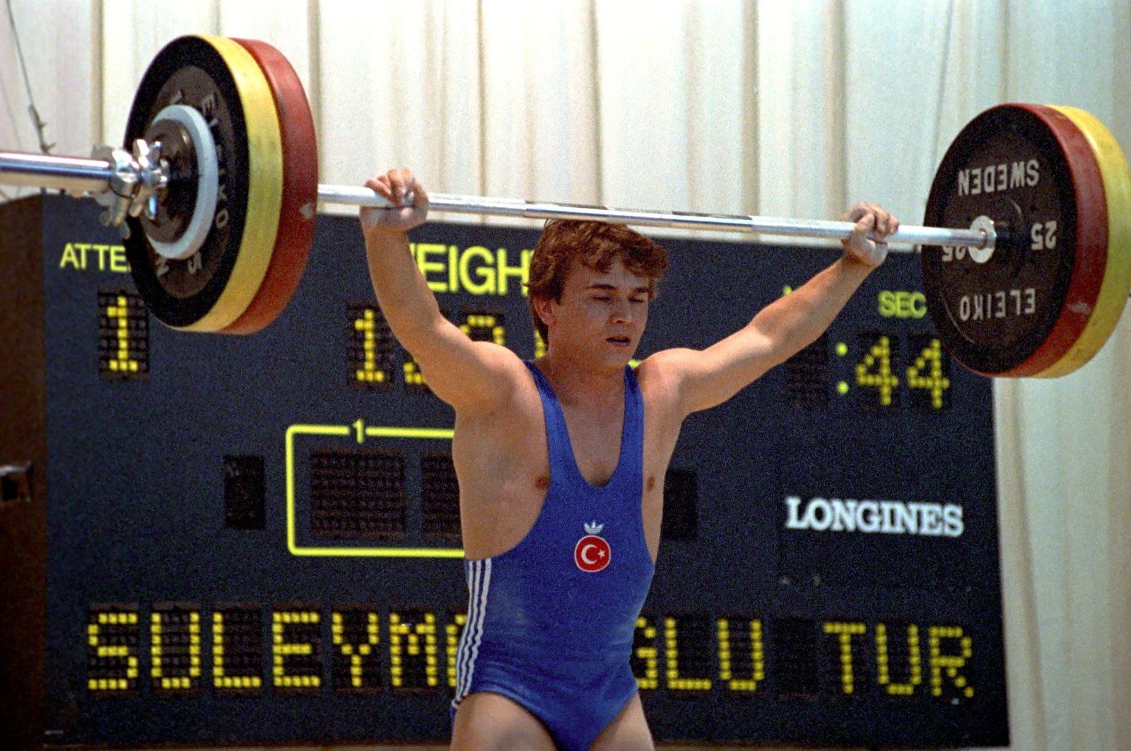 Naim Süleymanoğlu in action in 1991 Mediterranean Games, in Athens, Greece, July 1, 1991. (AA PHOTO)