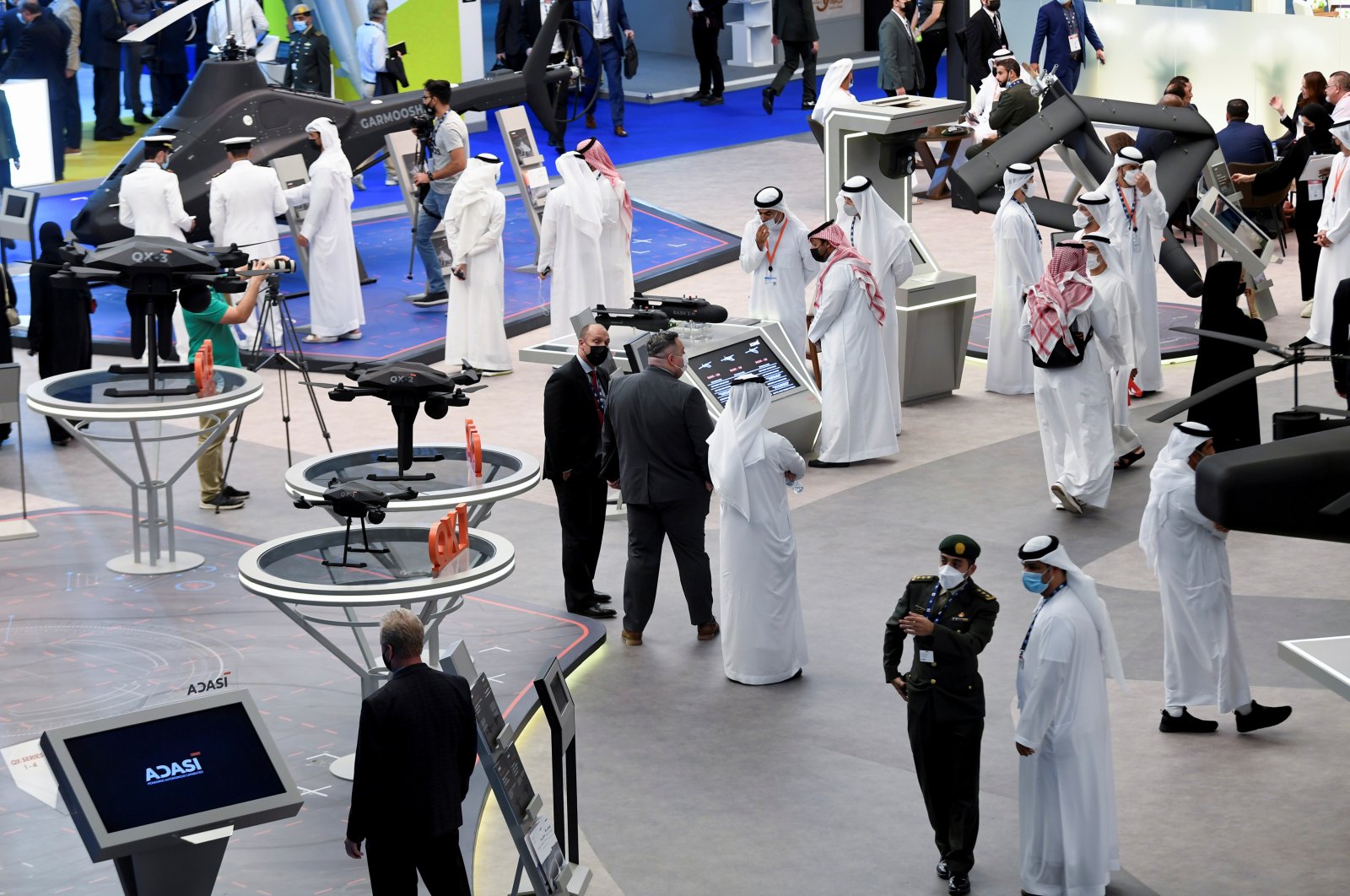 People visit the EDGE display during the Dubai Airshow in Dubai, UAE, Nov. 15, 2021. (Reuters Photo)