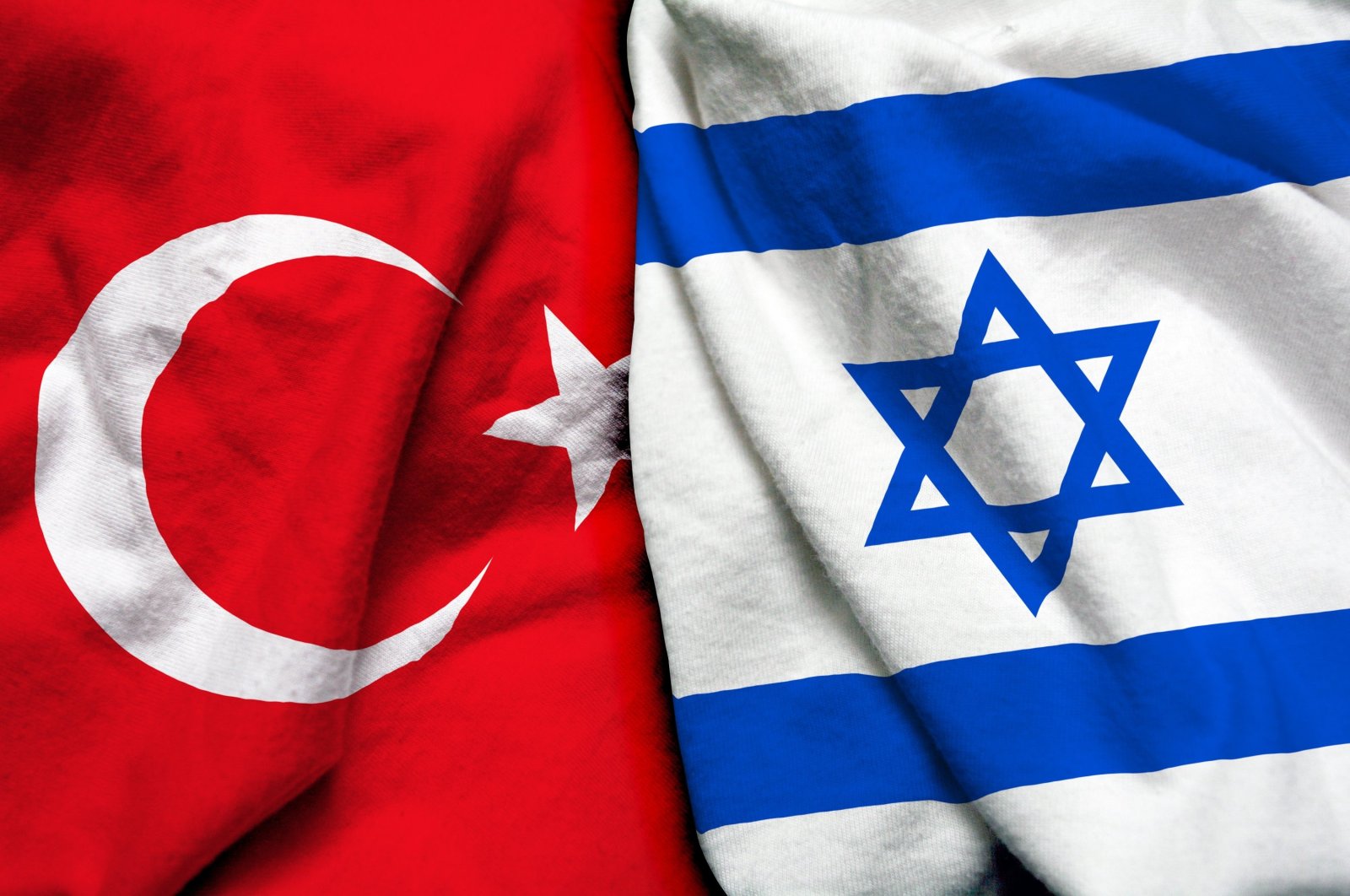 In this illustration photo, the flags of Turkey (L) and Israel are displayed side by side. (Photo by Shutterstock)