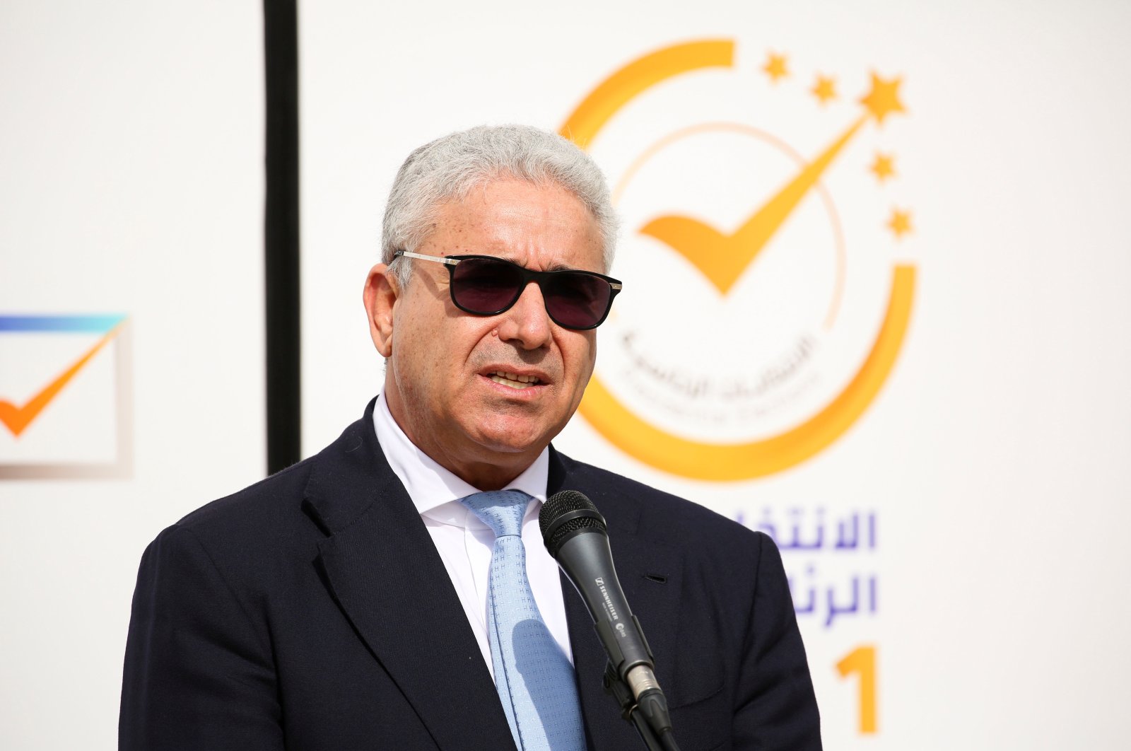 Fathi Bashagha, former Interior Minister, delivers a speech after submitting his candidacy papers for the upcoming presidential election at the Headquarters of the Electoral Commission in Tripoli, Libya, Nov. 18, 2021. (REUTERS)