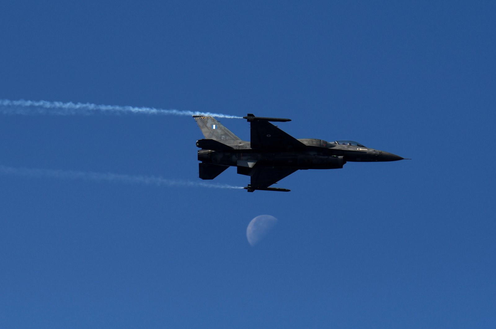 A Hellenic Air Force F-16 flies during a military parade marking an anniversary of the &quot;Ochi&quot; (No) Day in Thessaloniki, Greece, Oct. 28, 2021. (Reuters File Photo)