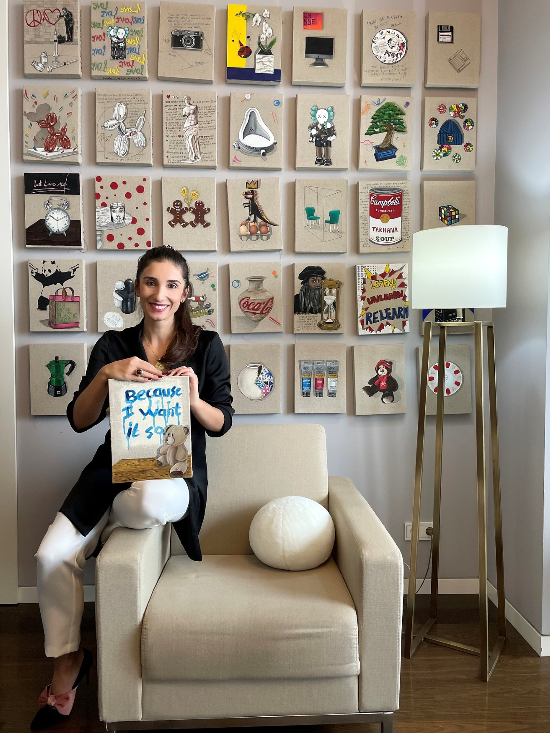 Dilek Yalçın poses with some of her paintings from “Innocence of Objects."