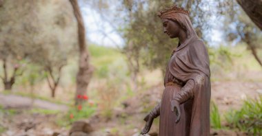 A figure of the Virgin Mary placed on the way to her house in Izmir province, Turkey. (Shutterstock Photo)