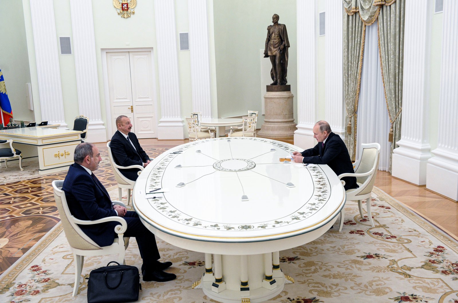 Russian President Vladimir Putin (R) attends talks with Azerbaijan&#039;s President Ilham Aliyev (2nd L) and Armenian Prime Minister Nikol Pashinian in the Kremlin in Moscow, Russia, Jan. 11, 2021. (Kremlin Pool Photo via AP)