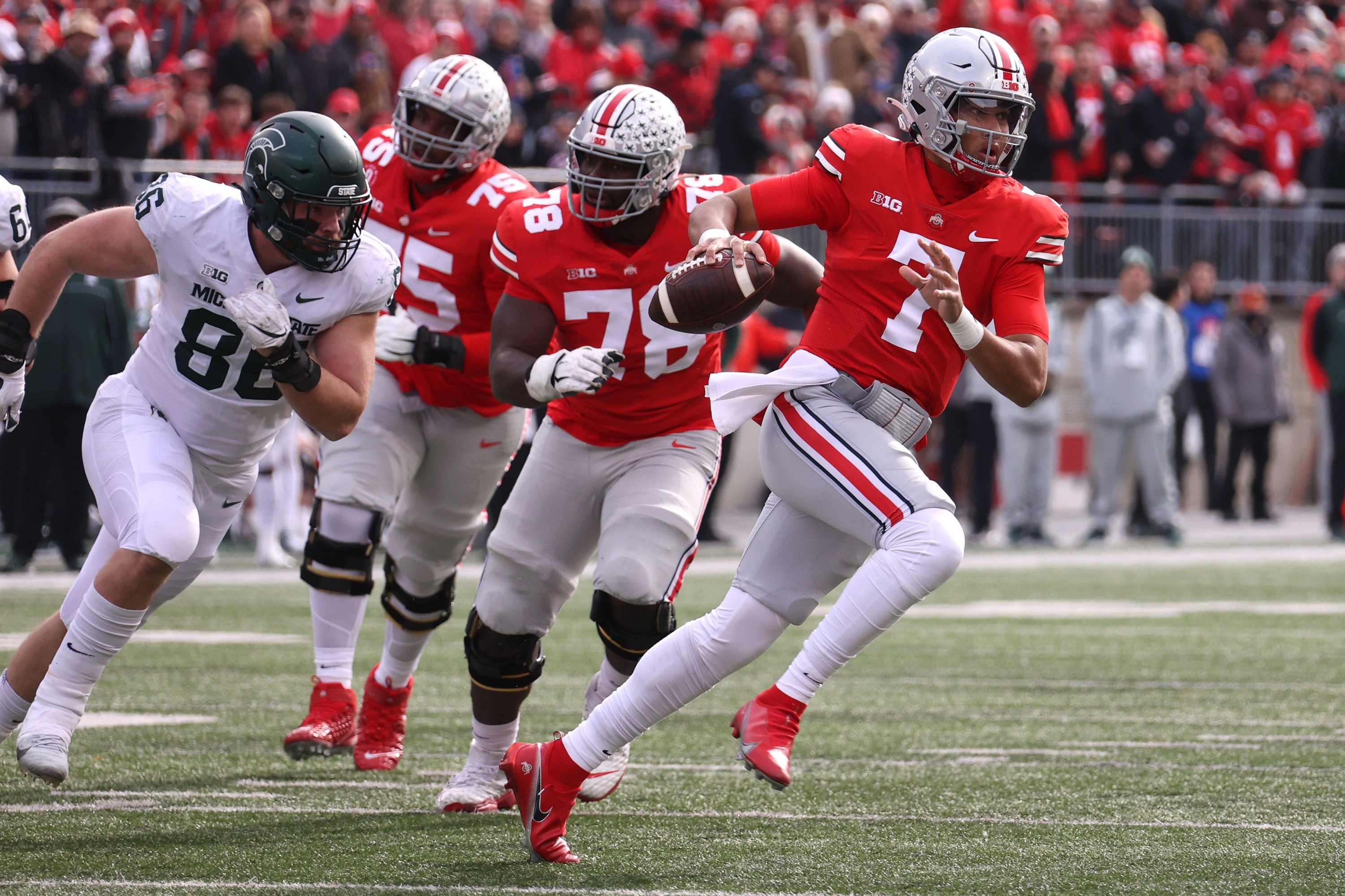 C.J. Stroud (7) of the Ohio State Buckeyes looks to make a pass while playing the Michigan State Spartans at Ohio Stadium, Columbus, Ohio, U.S., Nov. 20, 2021. (AFP Photo)