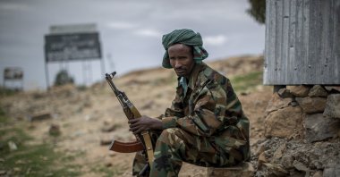 A fighter loyal to the Tigray People&#039;s Liberation Front (TPLF) mans a guard post on the outskirts of the town of Hawzen, then-controlled by the group, in the Tigray region of northern Ethiopia, May 7, 2021. (AP File Photo)