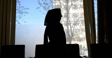 Madina, an Afghan former female journalist whose name has been changed to protect her identity, speaks during an interview in Kabul, Afghanistan, Nov. 13, 2021. (AFP Photo)