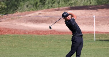 Collin Morikawa competes during the Dubai DP World Tour Championship, in Dubai, United Arab Emirates, Nov. 21, 2021. (AFP PHOTO) 
