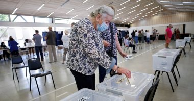 A woman casts her ballot during the presidential and parliamentary elections in Santiago, Chile, Nov. 21, 2021. (Reuters Photo)