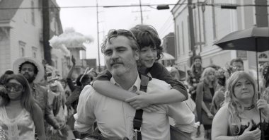 Joaquin Phoenix and Woody Norman, in a scene from the film &quot;C&#039;mon C&#039;mon.&quot; (A24 Films via AP)