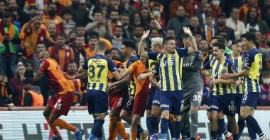 Fenerbahçe and Galatasaray players clash in derby game at Nef Stadyumu, Istanbul, Turkey, Nov. 21, 2021. (Reuters Photo)
