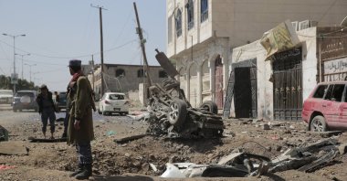 A soldier stands at the site of an airstrike by Saudi-led coalition in Sanaa, Yemen, Thursday, Nov, 11, 2021. (AP File Photo)