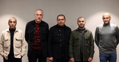 Turkish nationals (from left to right) Doğan Kıssa, Halil Gözel, Nurettin Çalık, İlker Sağlık and Ahmet Selvi speak to Anadolu Agency, Turkey, Nov. 21, 2021. (AA Photo)