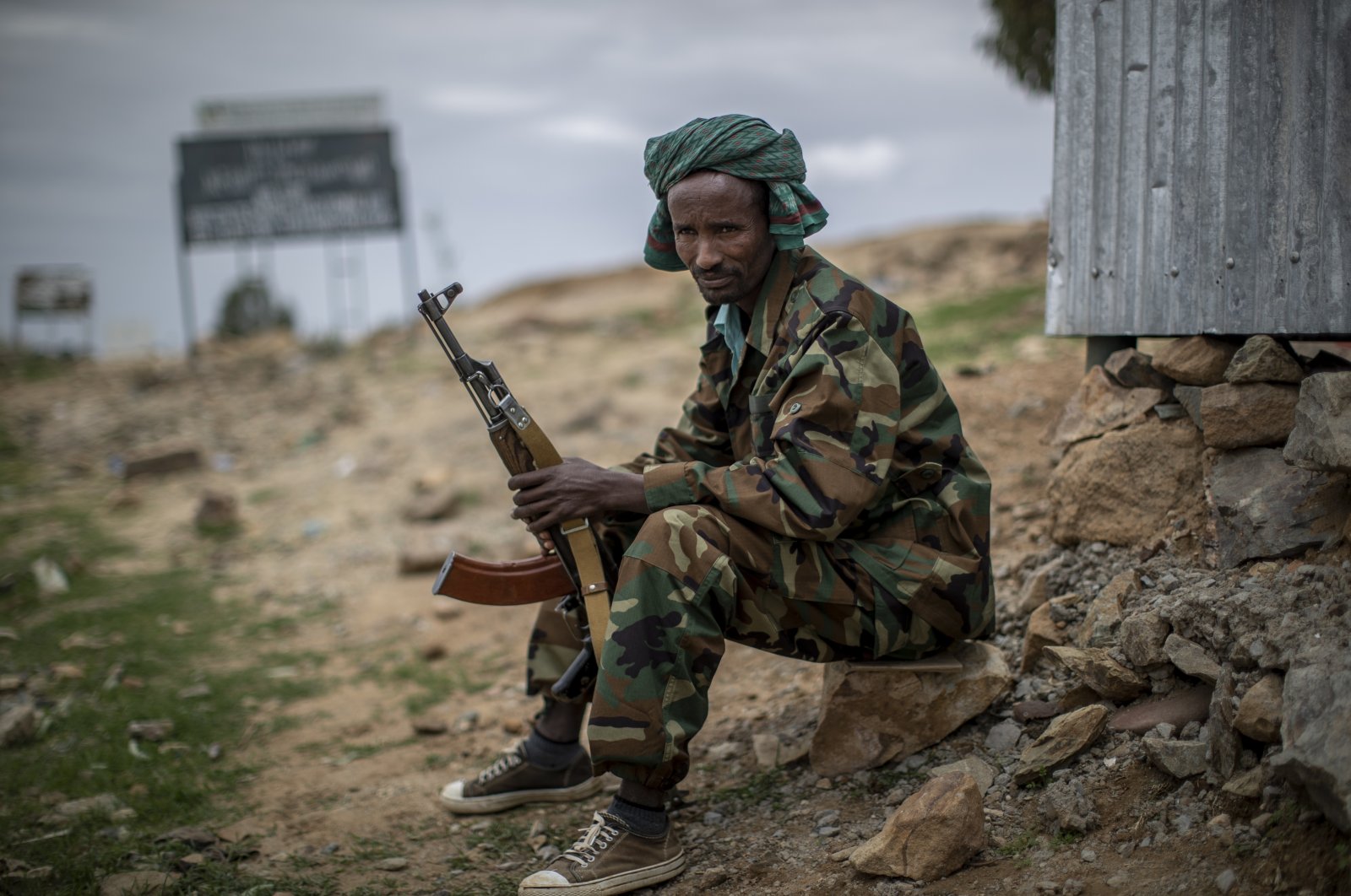 A fighter loyal to the Tigray People&#039;s Liberation Front (TPLF) mans a guard post on the outskirts of the town of Hawzen, then-controlled by the group, in the Tigray region of northern Ethiopia, May 7, 2021. (AP File Photo)