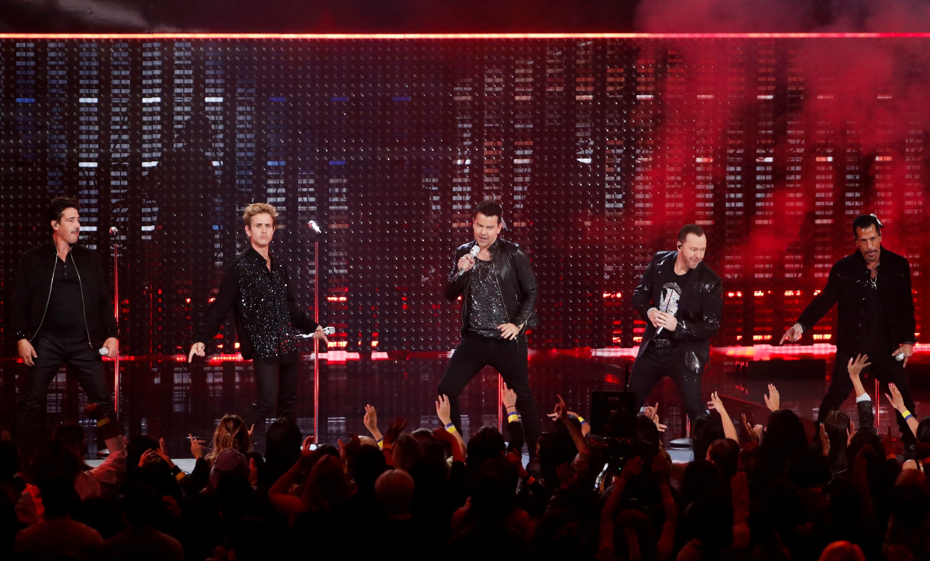 New Kids on the Block performs during the 49th Annual American Music Awards at the Microsoft Theatre in Los Angeles, California, U.S., Nov. 21, 2021. (REUTERS)