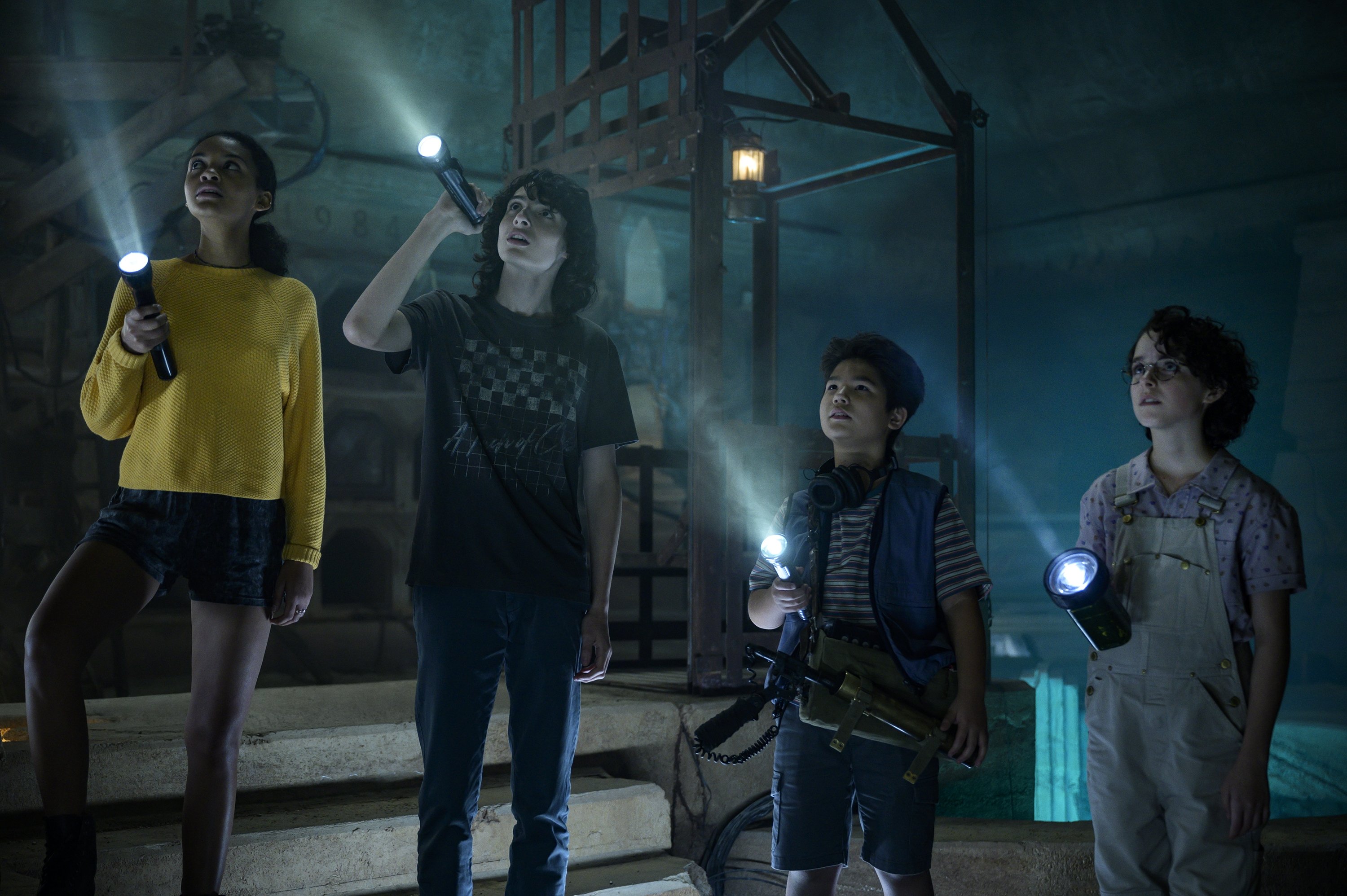 This image released by Sony Pictures shows, Celeste O'Connor, from left, Finn Wolfhard, Logan Kim and McKenna Grace in a scene from 
