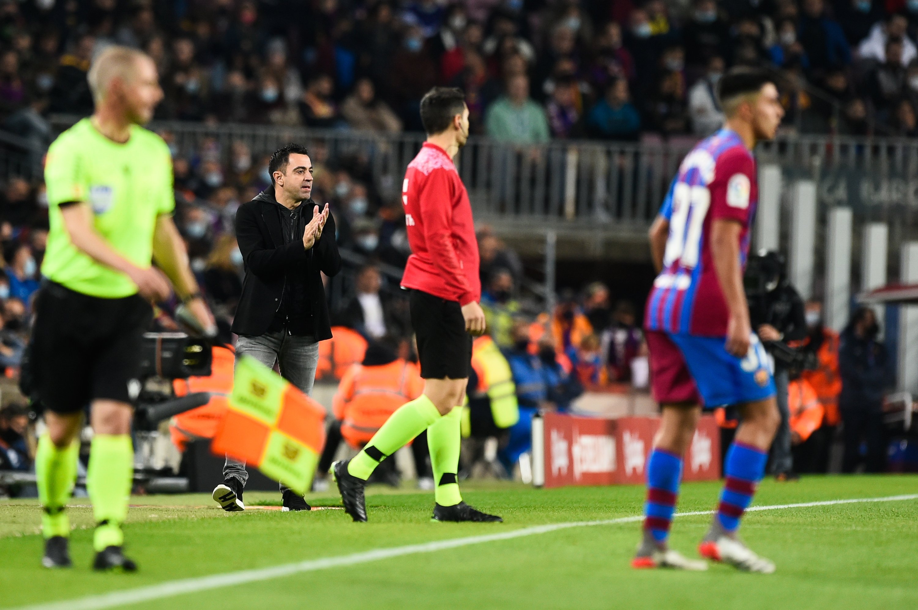Barcelona coach Xavi Hernandez (2nd R) reacts during a La Liga match against Espanyol, Barcelona, Spain, Nov. 20, 2021. (AA Photo)
