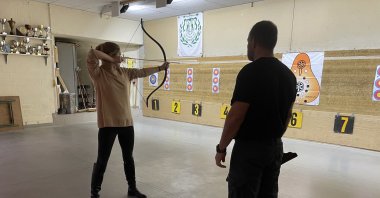 A participant takes training in traditional Turkish archery during the event in Brussels, Belgium, Nov. 21, 2021. (AA Photo)